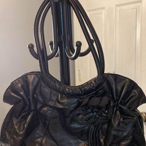 Cato black shoulder bag with floral detail EUC